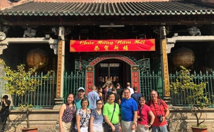 Cruise passengers exploring Ho Chi Minh City landmarks with private guide