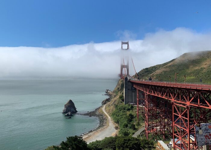 Tour van crossing Golden Gate Bridge with views of Alcatraz Island, Muir Woods redwoods, and Sausalito waterfront