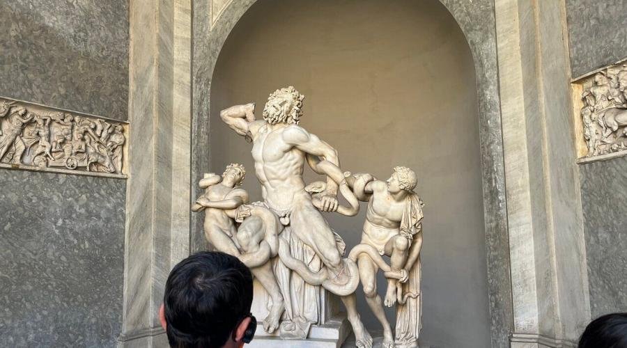 Guided group touring Vatican Museums with views of Sistine Chapel and St. Peter’s Basilica, skip-the-line entrance