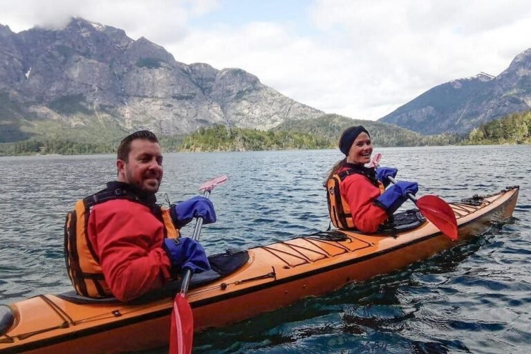 Mountain lake in Bariloche with hiking trail and sunset glow during Emilsa Tours’ 5-day adventure